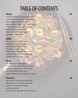 The Beauty Bites Recipe Guide by Basic Maintenance features a table of contents with dinner, salad, soup, and dessert recipes alongside page numbers, set over a background of noodles with shrimp, bell peppers, and green veggies.