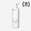 A white pump bottle labeled “The Conditioner” by Basic Maintenance stands on a white background, with a 2023 Best Conditioner award badge in the top right corner.
