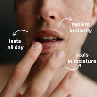 A close-up of a person applying Basic Maintenances The Lip Fix, with text pointing to their lips: “lasts all day,” “repairs instantly,” and “seals in moisture.”.