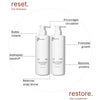 Two white pump bottles from Basic Maintenance’s Total Transformation Kit are shown with lines highlighting benefits: boosts circulation, builds volume, fights dandruff, restores proteins, and balances scalp biome.