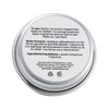 A round metal tin labeled “The Lip Fix” by Basic Maintenance with usage instructions and ingredients—lanolin anhydrous and fragrance—listed in English and French on the white lid.